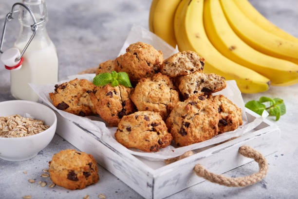 a tray of cookies and a bunch of bananas