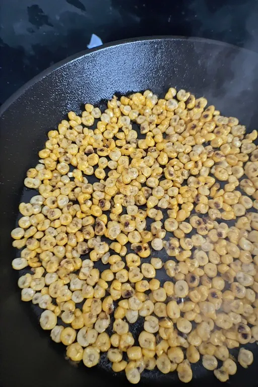 Toasted corn kernels in a pan