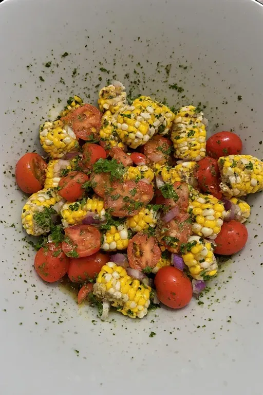 Colorful salad with corn and tomatoes