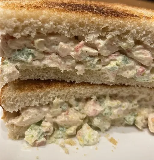 Classic creamy chicken salad sandwich ready to serve