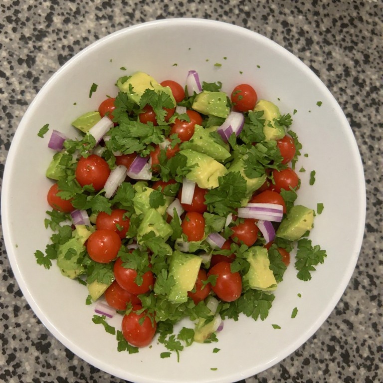 Fresh avocado salsa with tomatoes and cilantro for fiesta lime chicken recipe